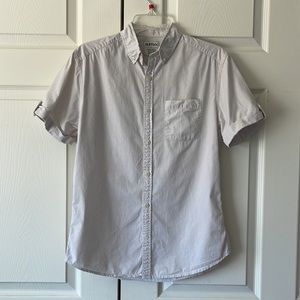 Ruffian for threads & Heirs Classic Tan & White pin striped button down blouse.